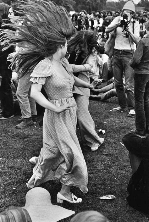 Woodstock Music Festival, 1969. Woman running through the mud at the Woodstock Music Festival, New York, US, 17th August 1969. (Photo by Owen Franken/Corbis via Getty Images))